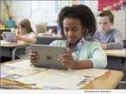 A student uses Studies Weekly Online in a classroom