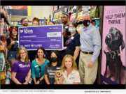 Staff from Petco and the Sacramento SPCA gathered for the check presentation at the Folsom retail store